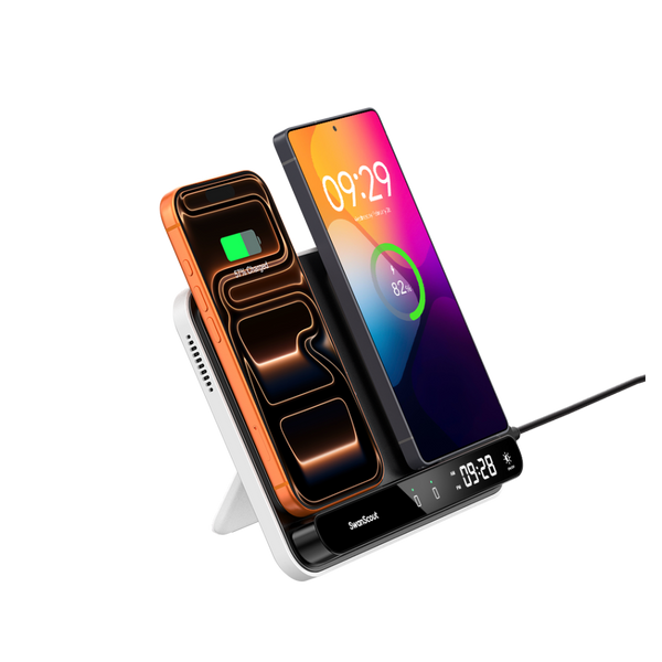 SwanScout 504 dual wireless charging stand simultaneously powering an iPhone 17 and a Samsung Galaxy S25 Ultra with a built-in touch clock.